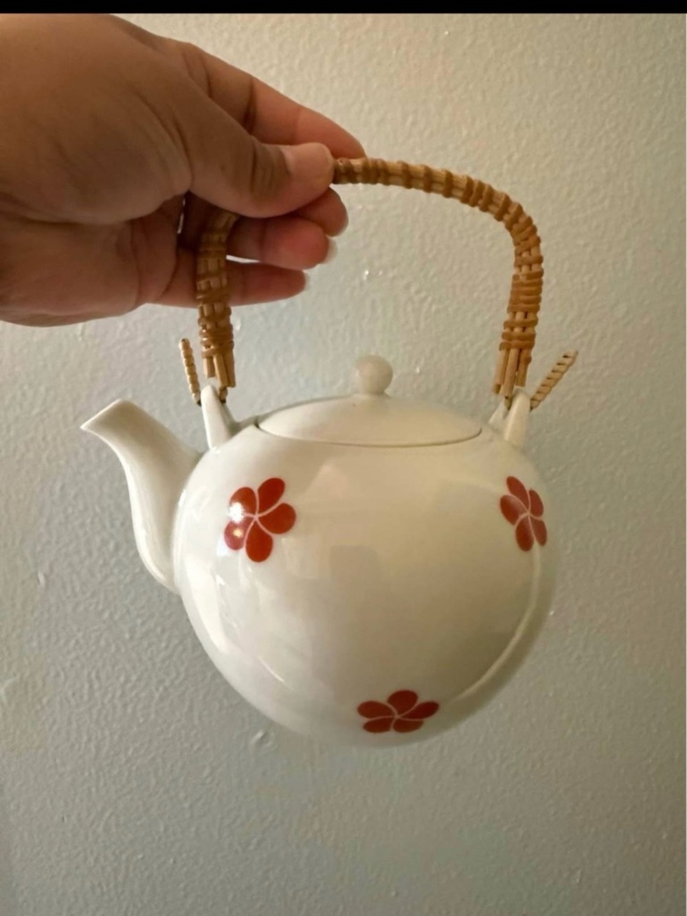 White Ceramic Teapot with Red Flower Motif and Woven Handle